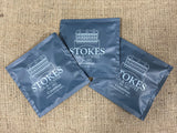 3 coffee bags on top of a hessian sack
