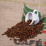 Perk Up Coffee Beans spilling out of Stokes Espresso Cup