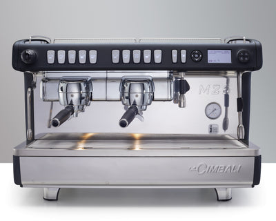 La Cimbali M26TE Espresso Machine with grey background